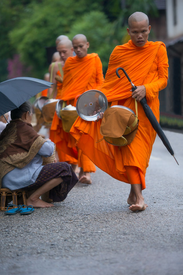 “Collecting Alms on a Rainy Day” by Neil Cordell